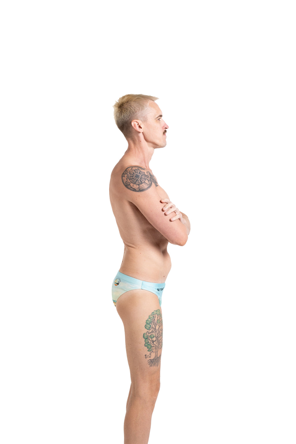 Salty Bunz Coastal Swim Brief Life on the Beach Racer 4cm with white background right sideGay swimwear Model Bevan
