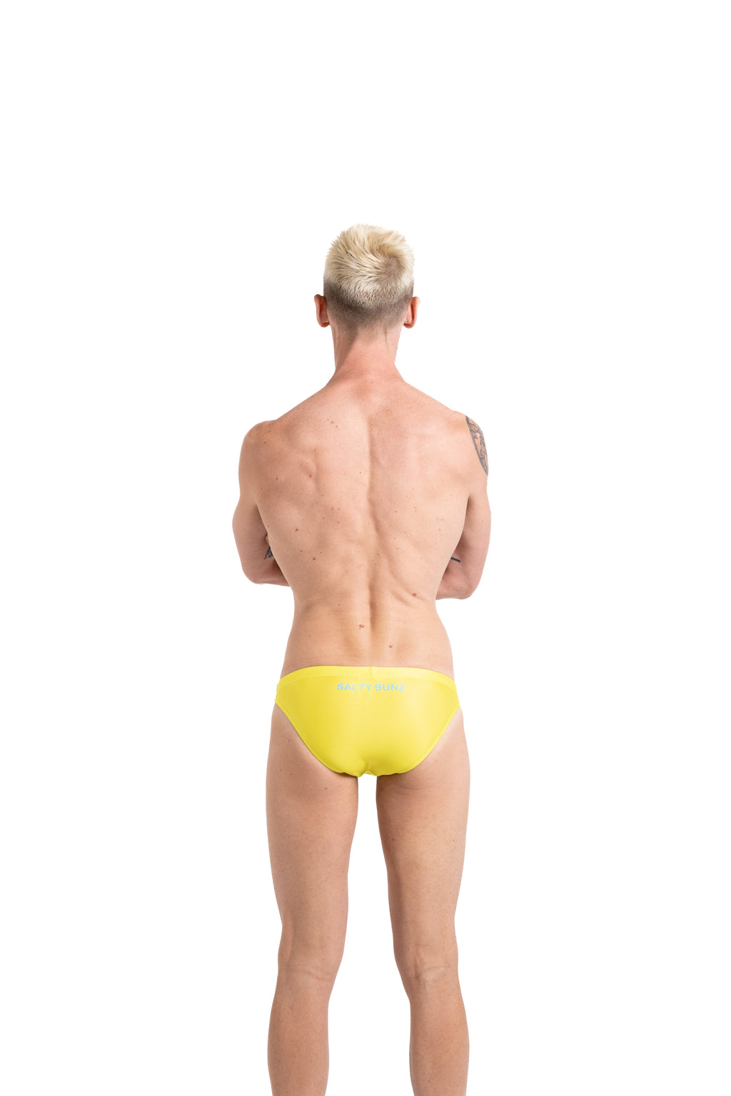 Salty Bunz Bikini Swim Brief Ultra-Thin 3.5cm Citrus Current Yellow with white background rear Gay swimwear Model Bevan