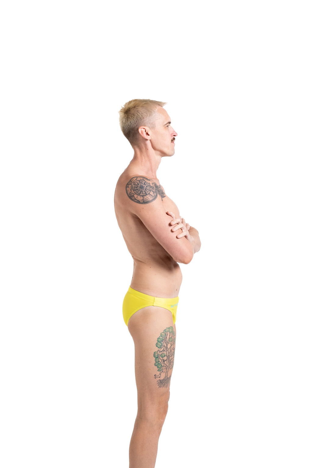 Salty Bunz Bikini Swim Brief Ultra-Thin 3.5cm Citrus Current Yellow with white background right side Gay swimwear Model Bevan