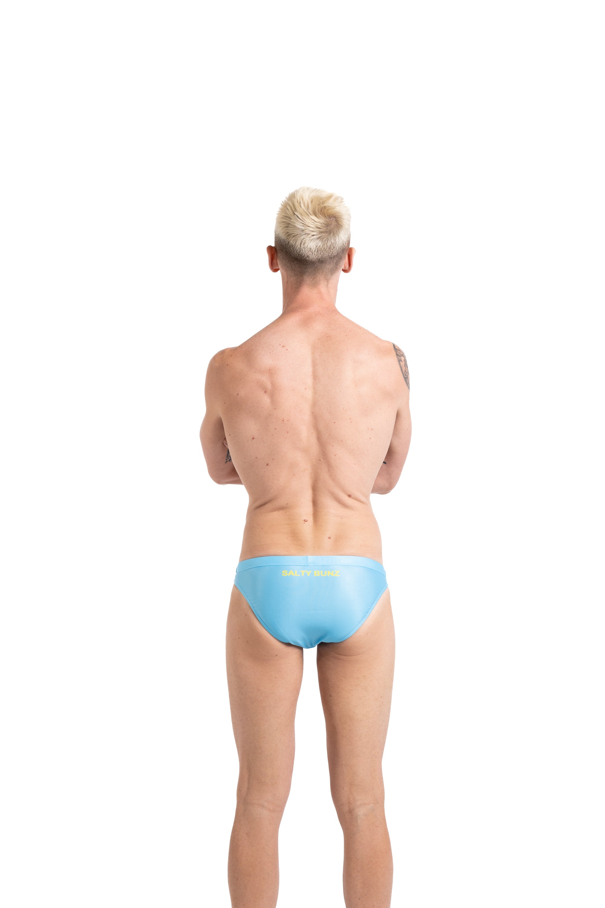 Salty Bunz Bikini Swim Brief Ultra-Thin 3.5cm Ocean Oasis Sky Blue with white background rear Gay swimwear Model Bevan 