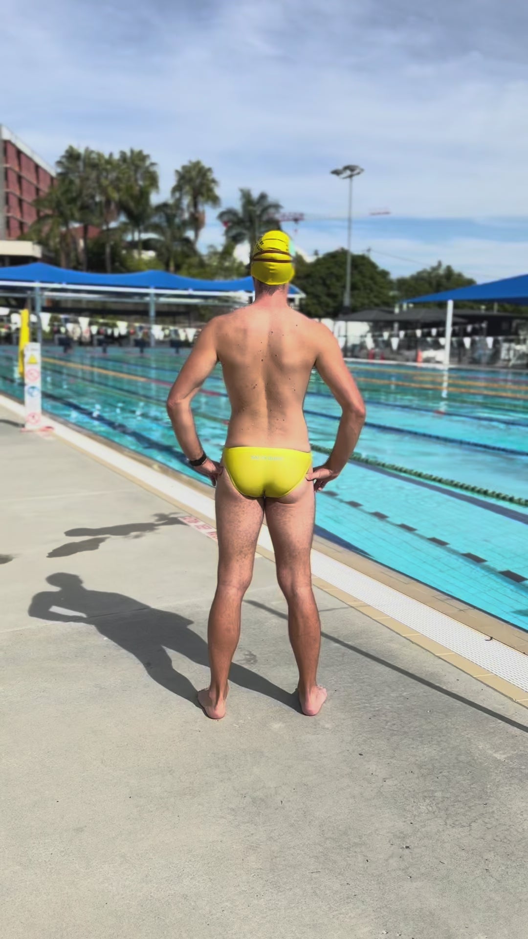 Salty Bunz Bikini Swim Brief Ultra-Thin 3.5cm Citrus Current Yellow with competition pool background video Gay swimwear Model Jonas